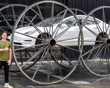 Maluco Colocou Rodas De 3 Metros Num Tesla Model 3 Maluco Colocou Rodas De 3 Metros Num Tesla Model 3