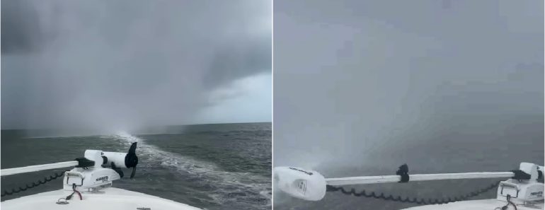 Aventureiro Guiou o Seu Barco Através De Uma Tromba De Água Aventureiro Guiou o Seu Barco Através De Uma Tromba De Água